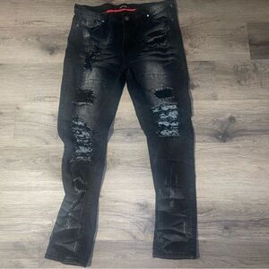Encrypted  distressed skinny jeans